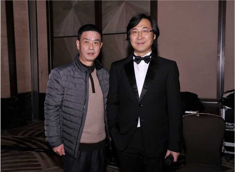 2015年12月25日朱亚东与著名歌唱家廖昌永合影