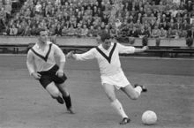 1960年的拉恩（右）在赛场上
