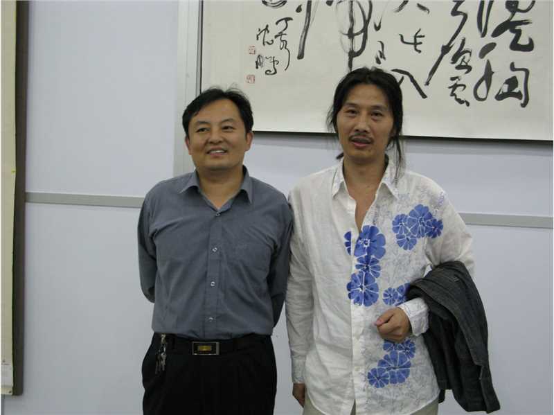 周祥林先生同高级编辑王克煜教授（左）合影